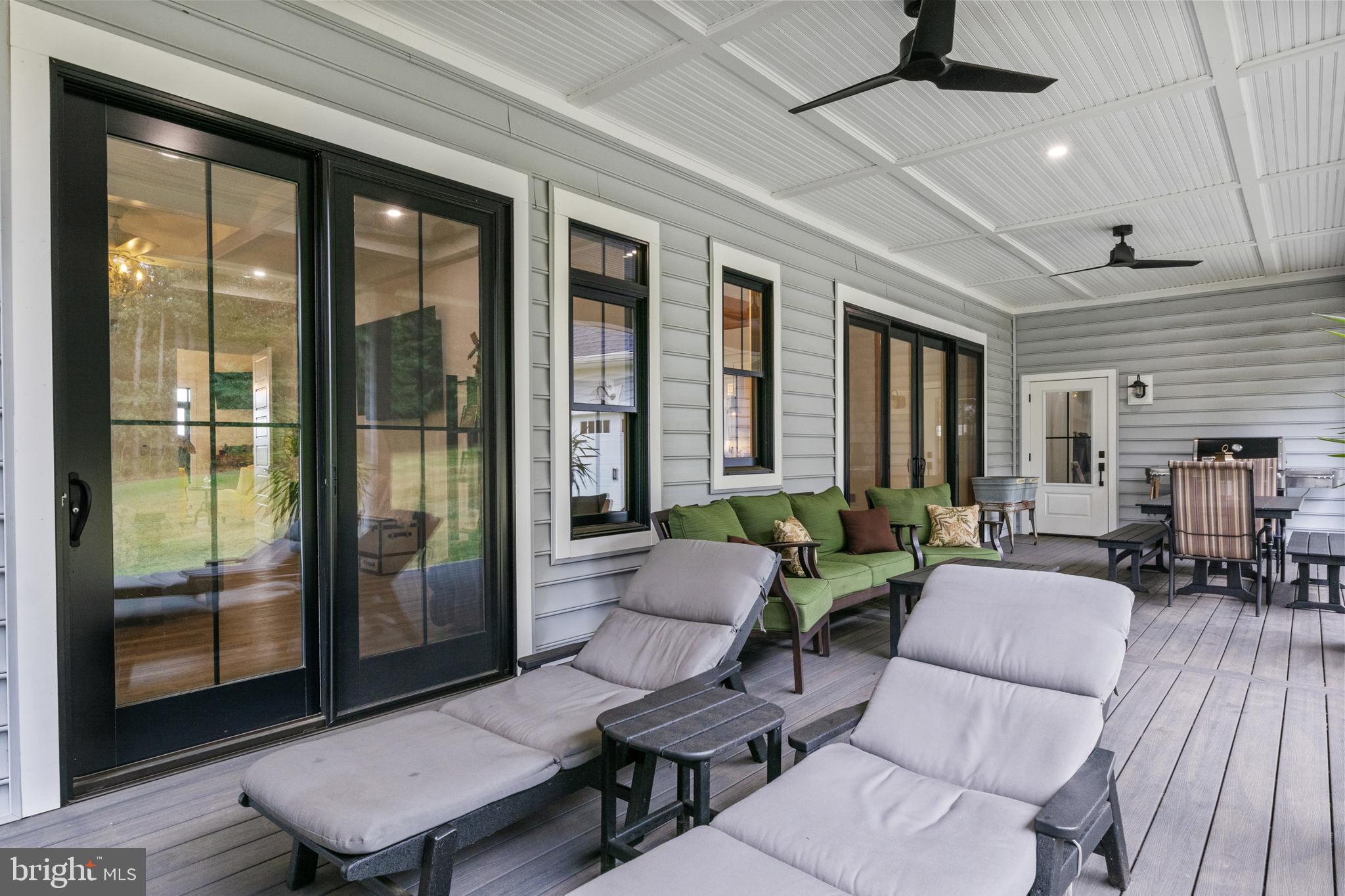 4073 Landis Road Hanover, PA 17331 - Photo 73 of 100 a living room with furniture and a floor to ceiling window