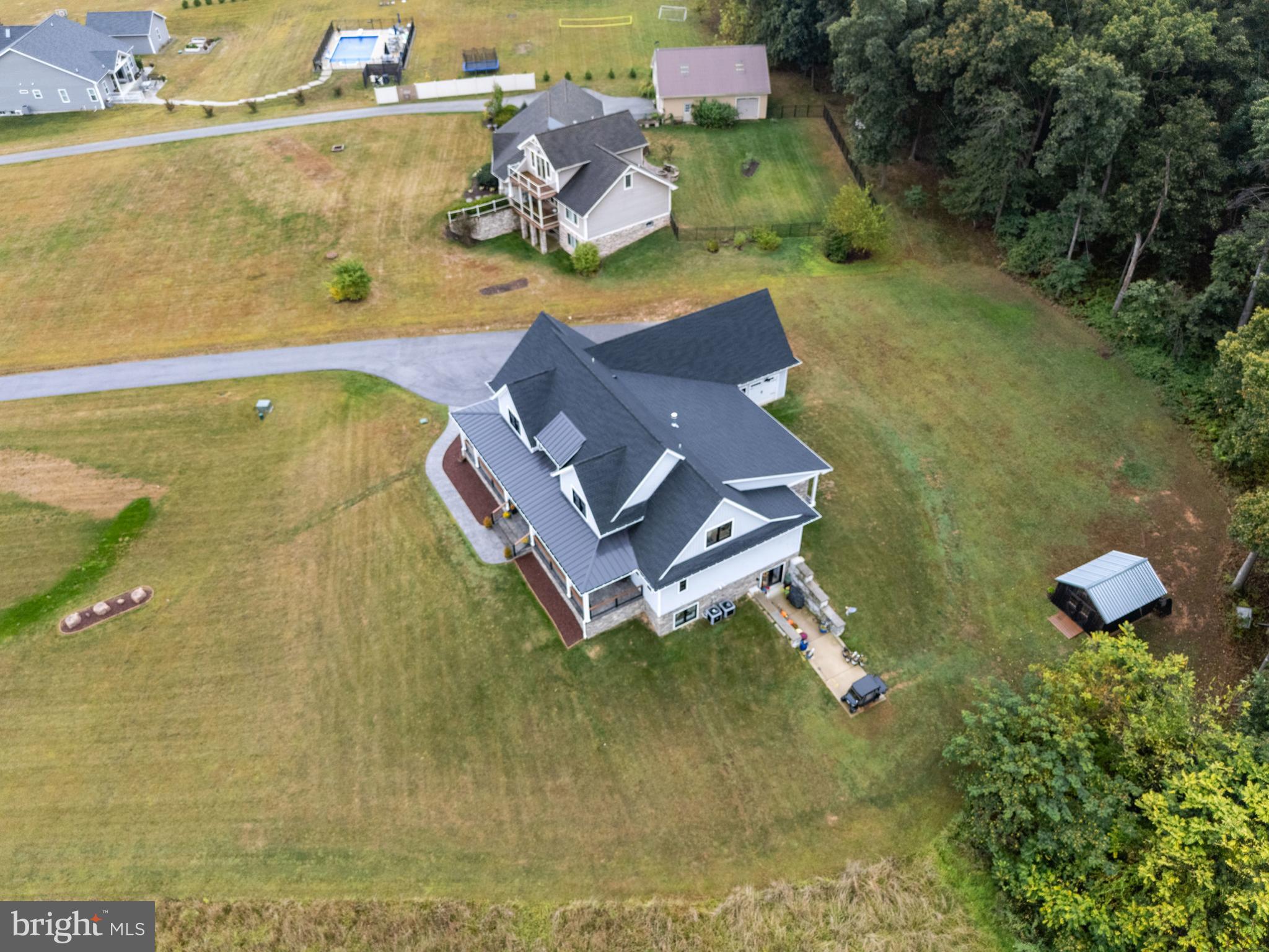 4073 Landis Road Hanover, PA 17331 - Photo 85 of 100 an aerial view of house with yard swimming pool and outdoor seating