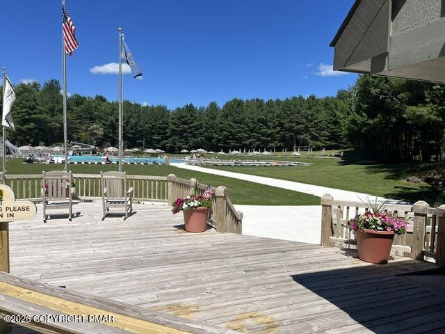 355 Windy Bush Road Long Pond, PA 18334 - Photo 44 of 49 a view of a swimming pool with a patio
