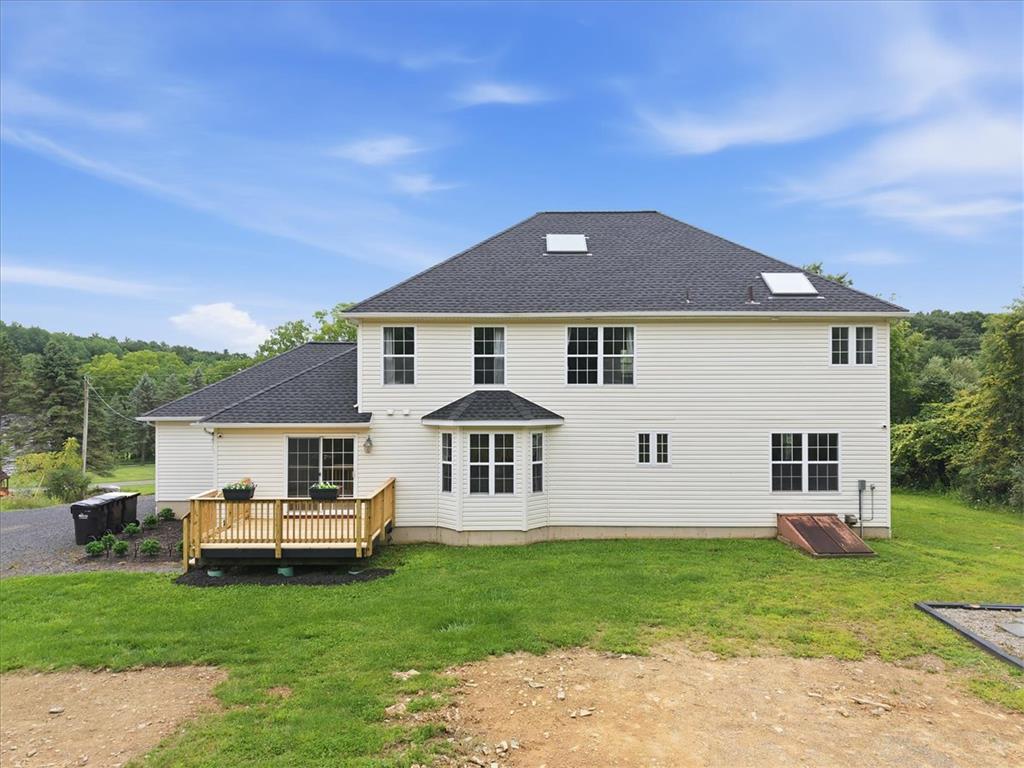 387 Blue Ridge Road Saylorsburg, PA 18353 - Photo 82 of 90 A classic white-sided home boasts a new deck, skylights, and a serene natural backdrop.