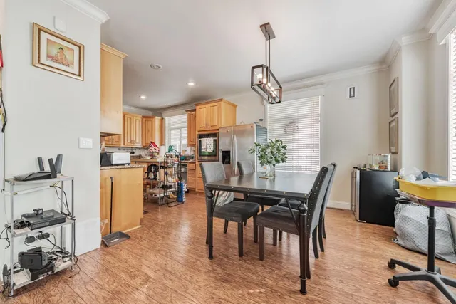 a view of a dining room with furniture