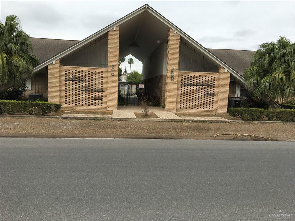 700 Fern Street, Unit 5 McAllen, TX 78504 - Photo 1 of 22 a front view of a house with a garage