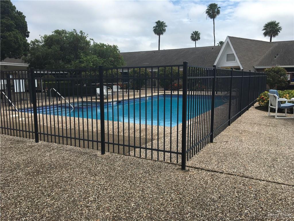 700 Fern Street, Unit 5 McAllen, TX 78504 - Photo 18 of 22 a view of a wrought iron fences in front of house