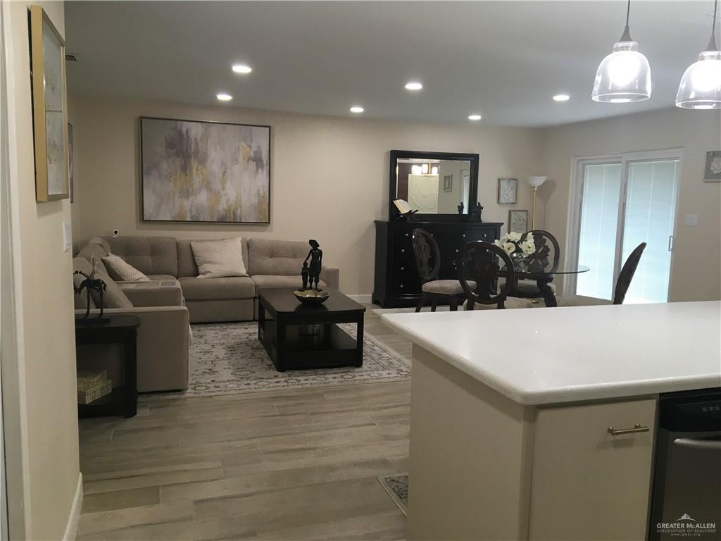 700 Fern Street, Unit 5 McAllen, TX 78504 - Photo 3 of 22 a large room with wooden floor