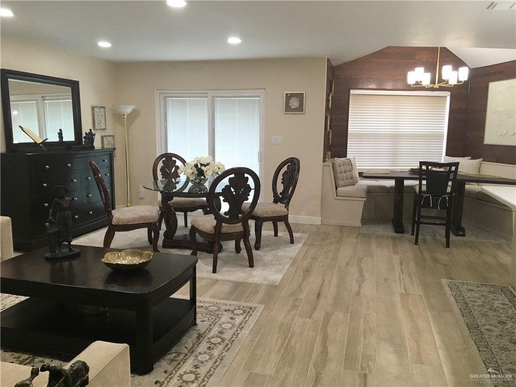 700 Fern Street, Unit 5 McAllen, TX 78504 - Photo 9 of 22 a view of a dining room with furniture