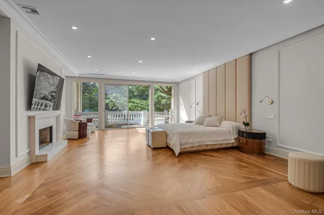 a living room with furniture a window and kitchen view