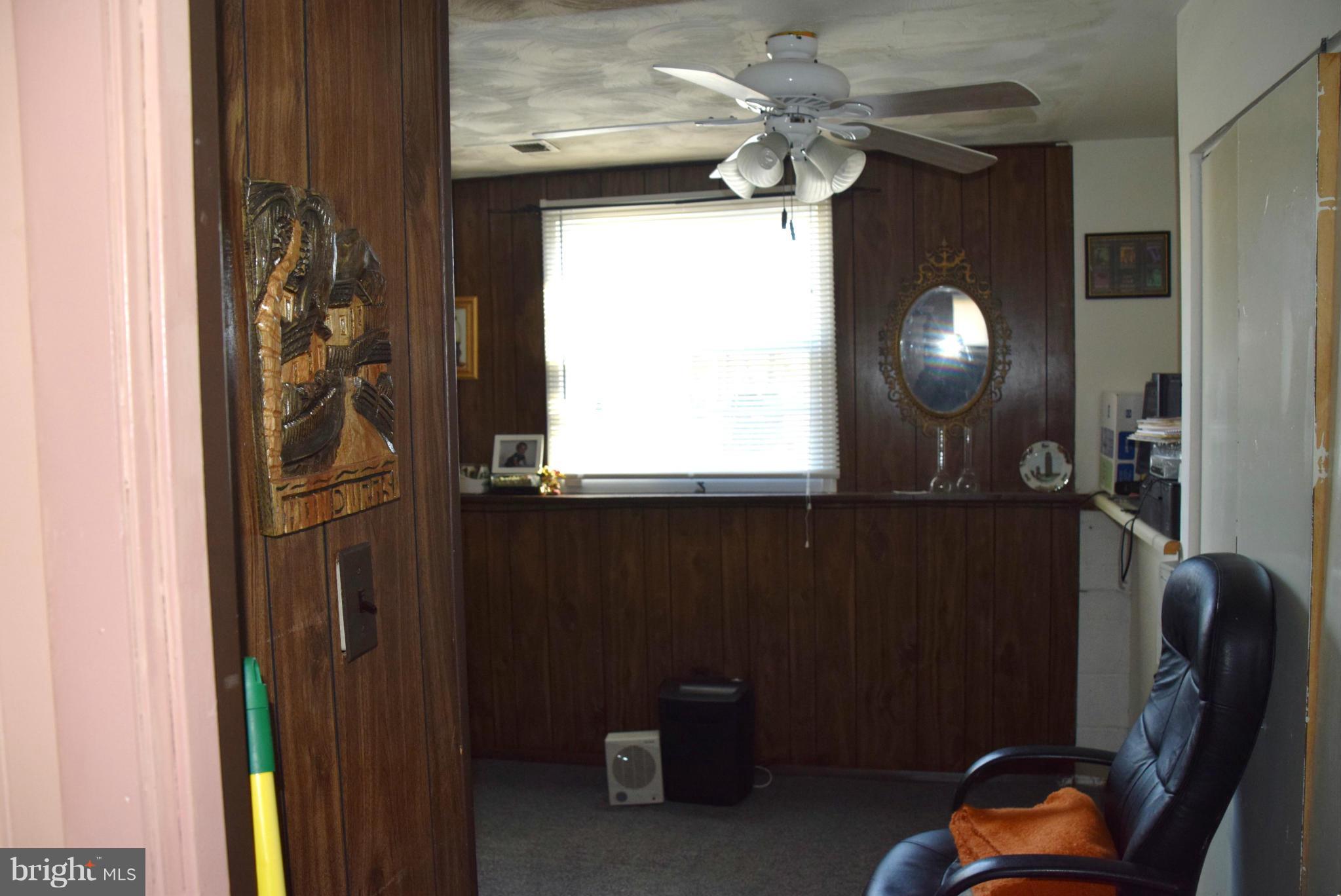 4012 Winlee Road Randallstown, MD 21133 - Photo 9 of 22 a view of workspace with window and hallway