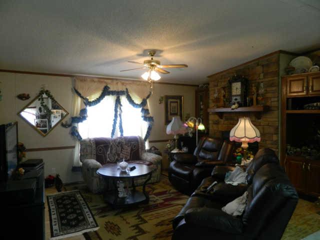 2305 Shady Grove Road Morrison, TN 37357 - Photo 6 of 12 Den with Built-in Book Cases, Rock Fireplace