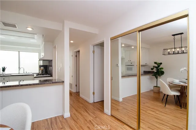 a view of a kitchen from the hallway