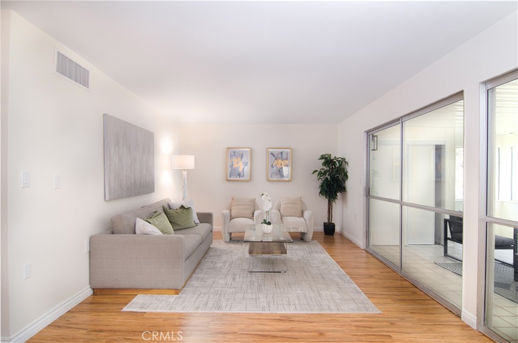 26701 Oak Branch Circle Newhall, CA 91321 - Photo 17 of 44 a living room with furniture and a rug