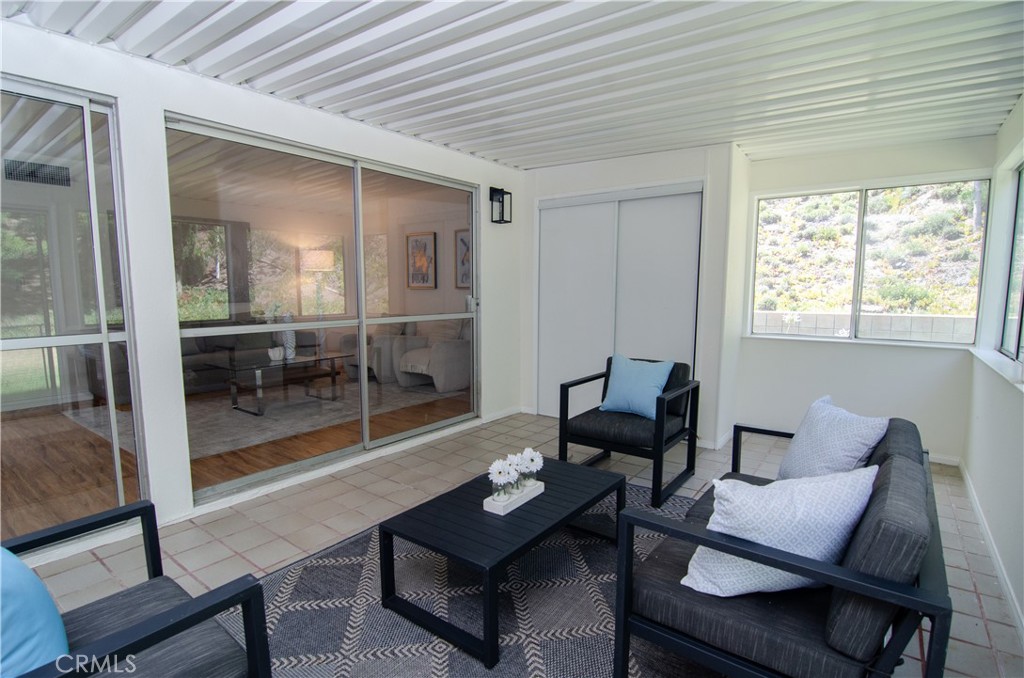 26701 Oak Branch Circle Newhall, CA 91321 - Photo 25 of 44 a living room with furniture and a window