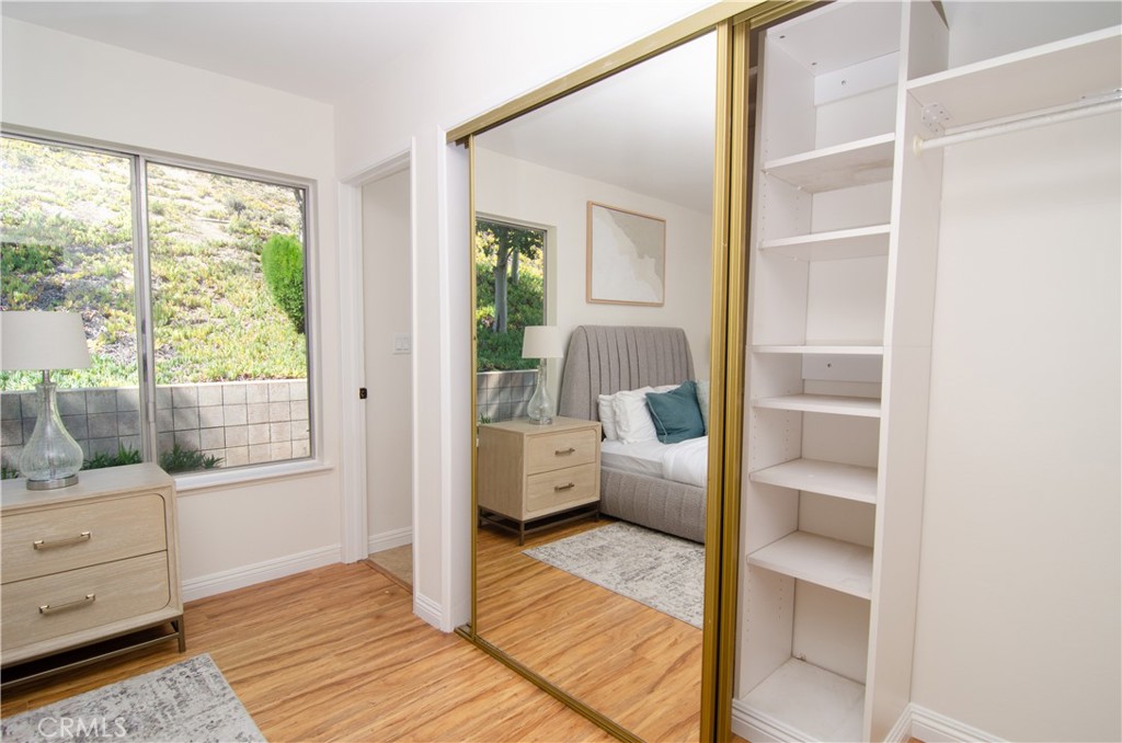 26701 Oak Branch Circle Newhall, CA 91321 - Photo 30 of 44 a living room with furniture and a large window