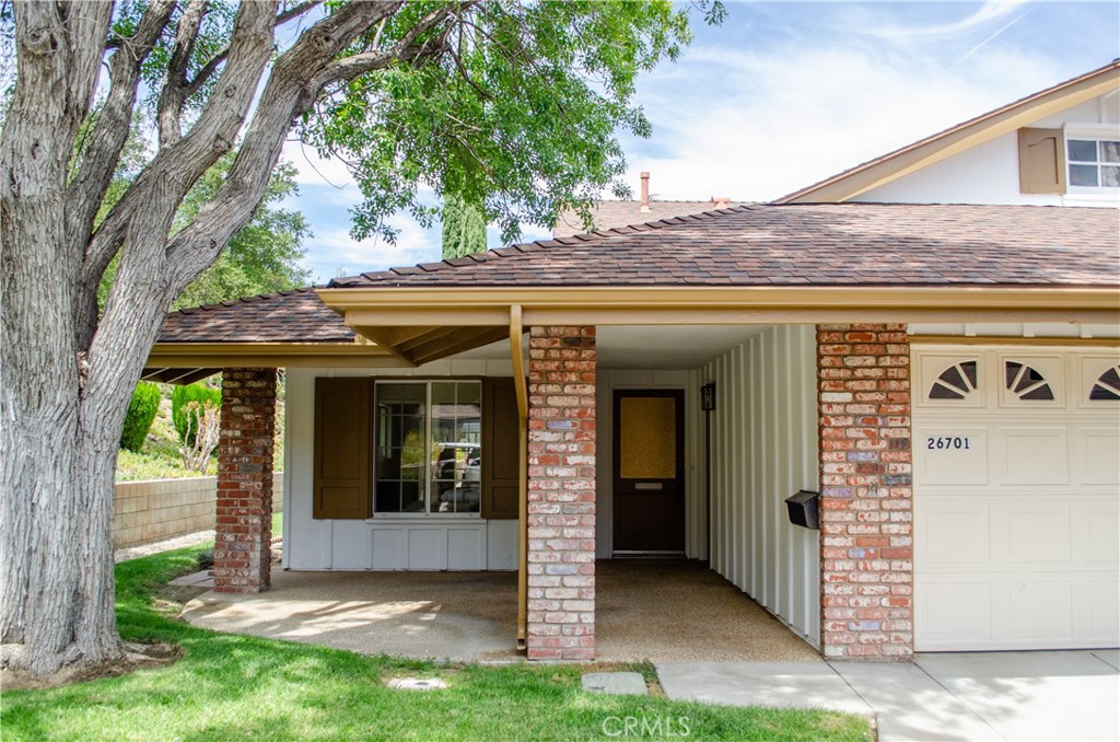 26701 Oak Branch Circle Newhall, CA 91321 - Photo 3 of 44 a view of a entryway door front of house