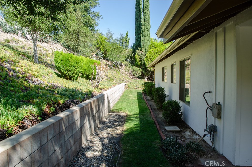 26701 Oak Branch Circle Newhall, CA 91321 - Photo 4 of 44 a view of house with a yard