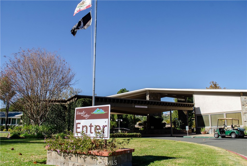 26701 Oak Branch Circle Newhall, CA 91321 - Photo 43 of 44 a front view of a building with garden