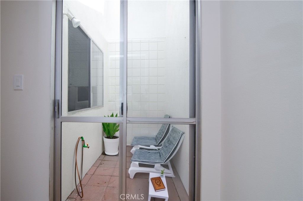 26701 Oak Branch Circle Newhall, CA 91321 - Photo 10 of 44 a view of a hallway with chair and table