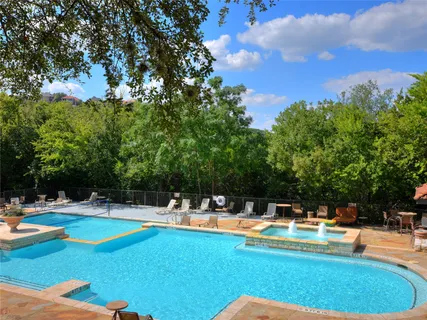 a view of pool with an outdoor seating