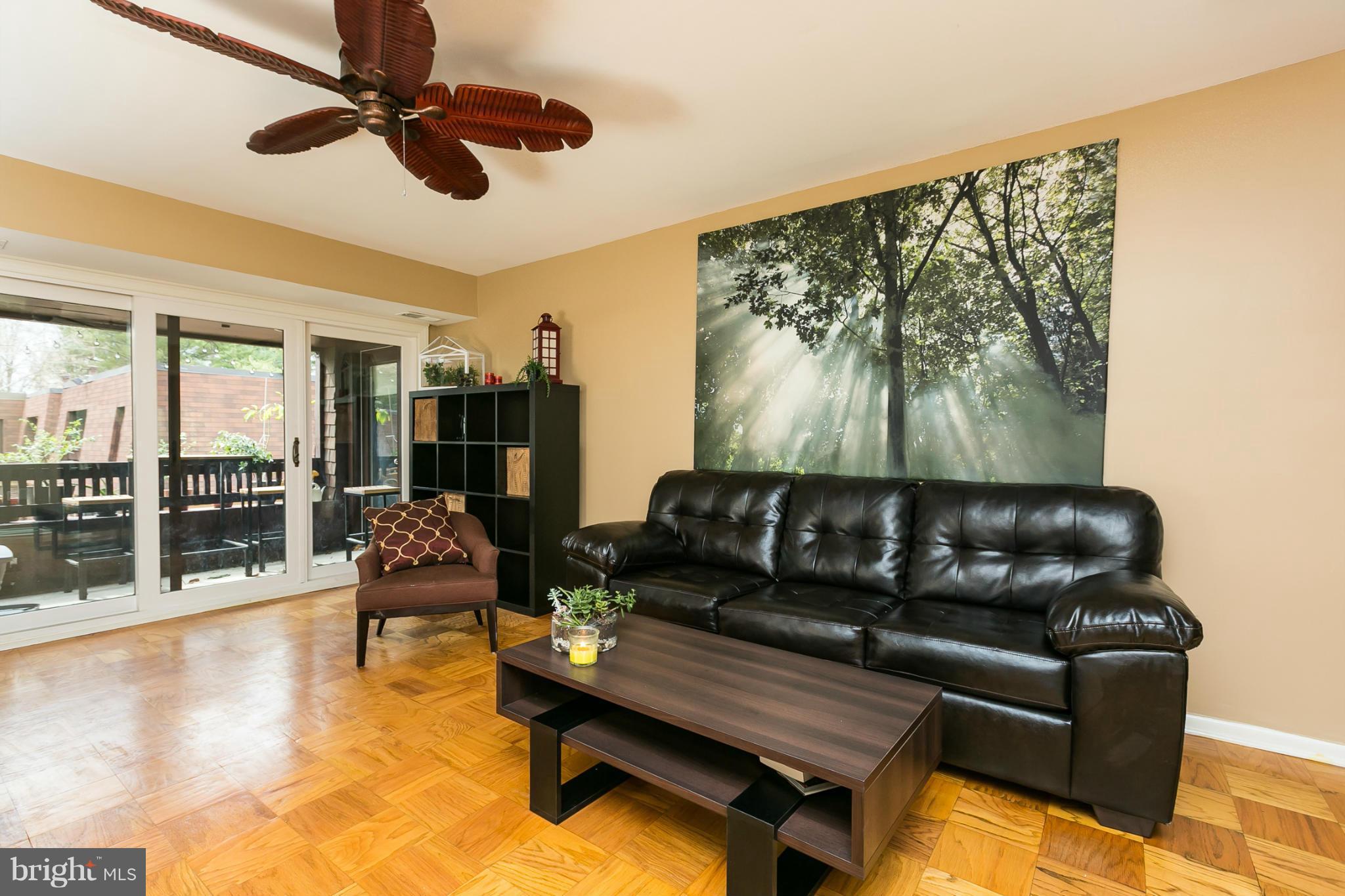 5235 West Running Brook Road, Unit 302 Columbia, MD 21044 - Photo 10 of 29 a living room with furniture and a large window
