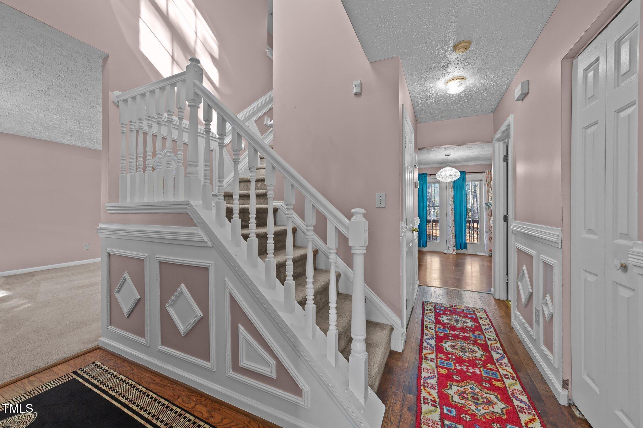 300 Pate Street Apex, NC 27502 - Photo 15 of 38 a view of an entryway with wooden floor