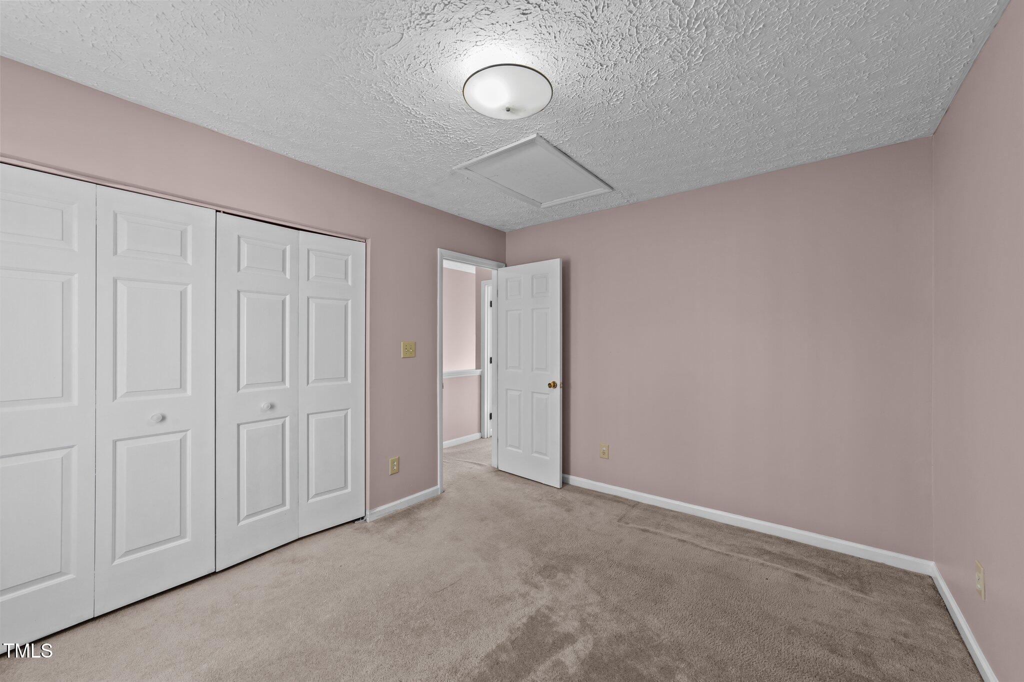 300 Pate Street Apex, NC 27502 - Photo 22 of 38 a view of a room with wooden floor