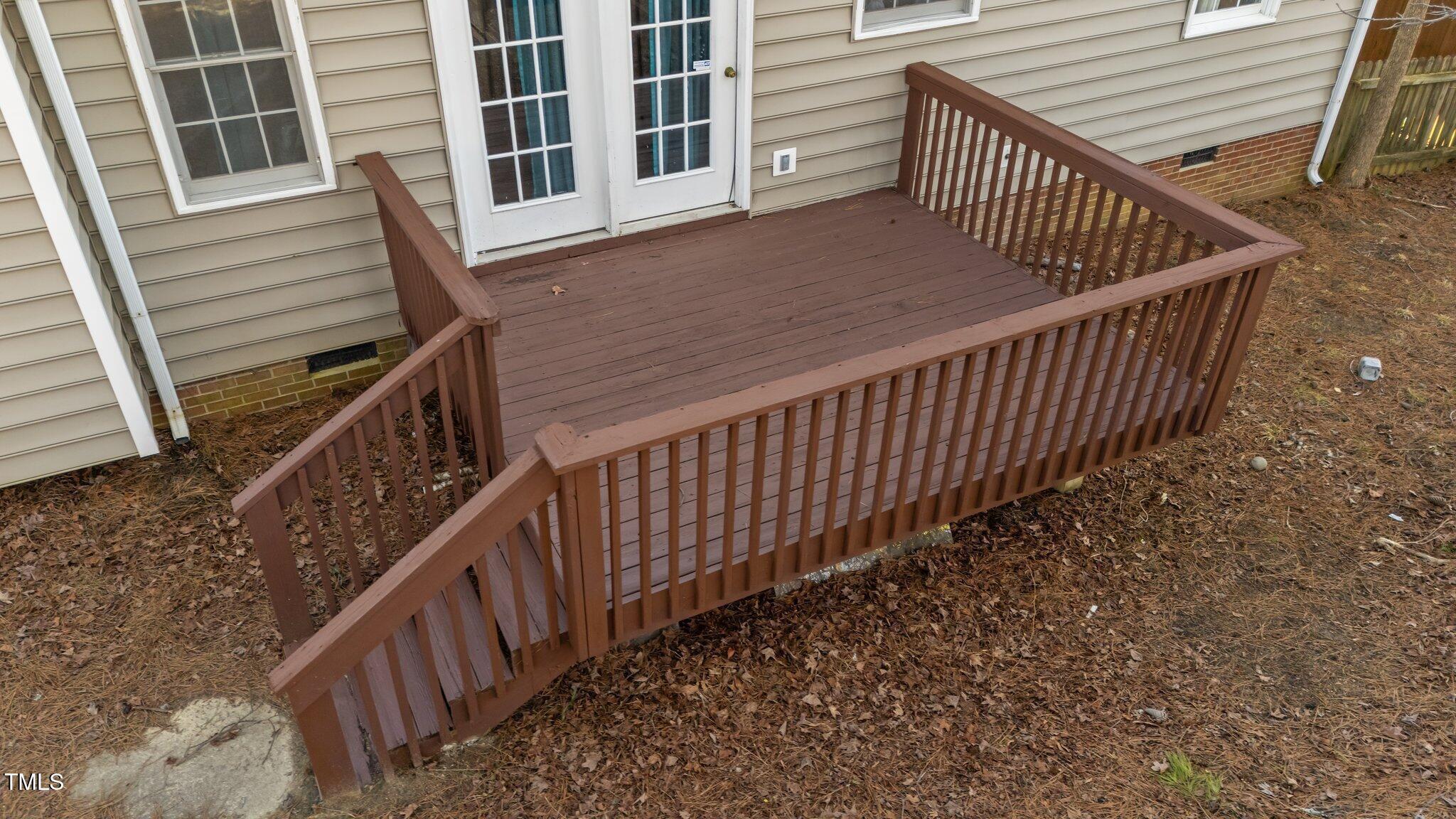 300 Pate Street Apex, NC 27502 - Photo 31 of 38 a view of balcony with wooden deck