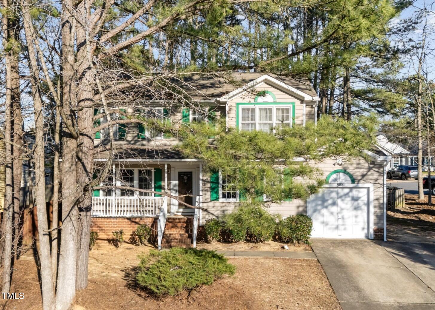 300 Pate Street Apex, NC 27502 - Photo 34 of 38 a front view of a house with a yard