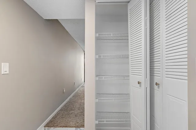 a bathroom with a toilet and a bathtub