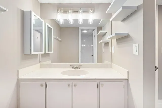 a view of livingroom with book shelf