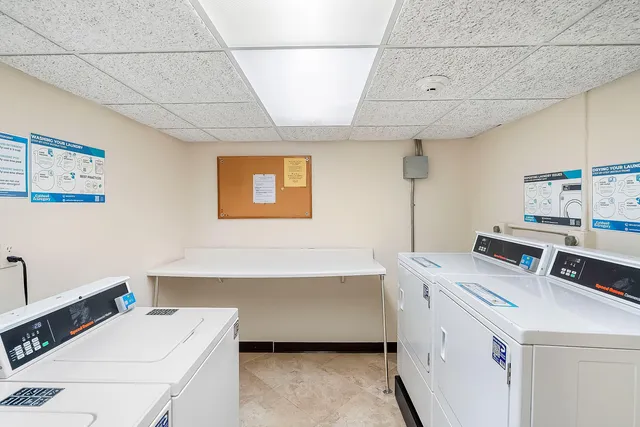 a view of a chairs and table in a patio