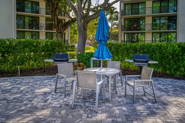 a view of a lake with sitting area