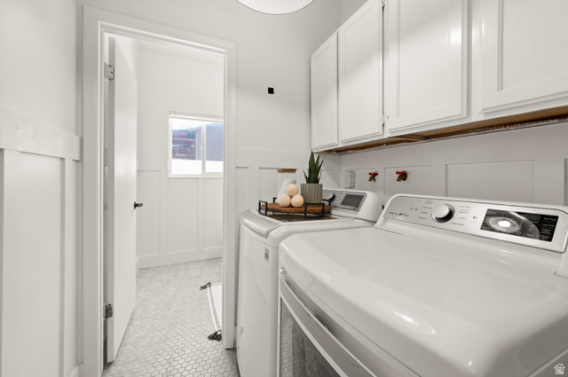 2163 Borg Drive Sandy, UT 84092 - Photo 22 of 31 Laundry area with a decorative wall, wainscoting, cabinet space, washer and clothes dryer, and light tile patterned flooring