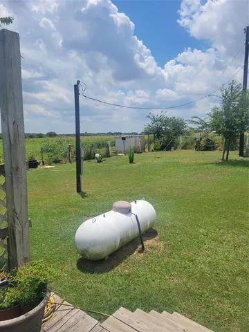 a view of a golf course with a yard