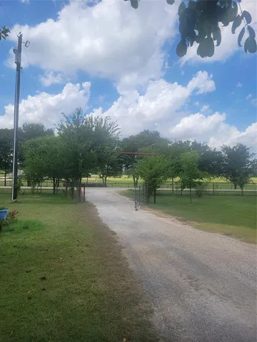 a view of a lake with a big yard