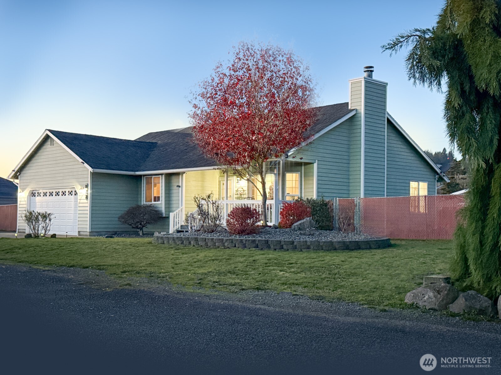 823 Southwest 21st Street Chehalis, WA 98532 - Photo 38 of 38 a view of a house with a big yard and potted plants