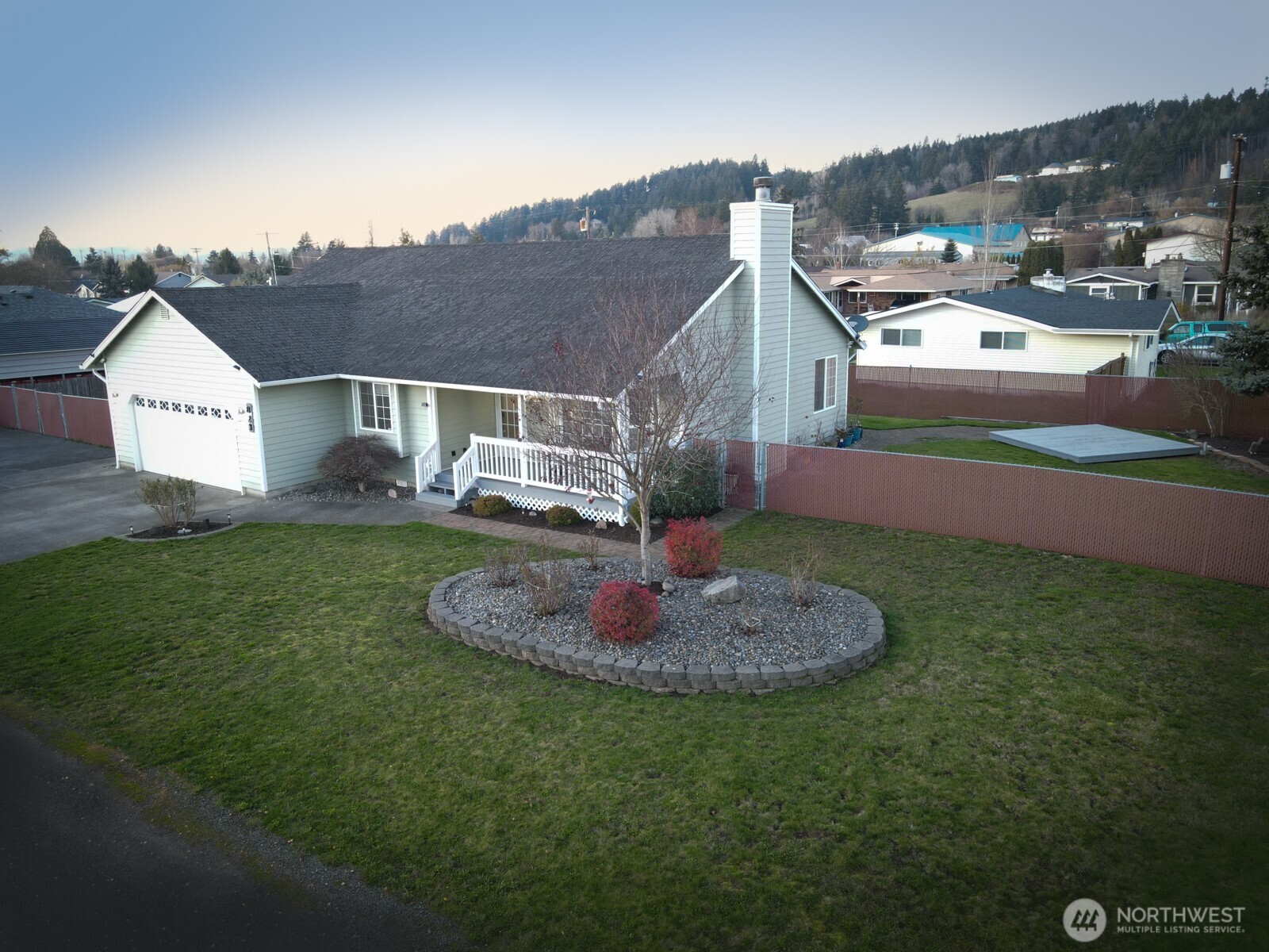 823 Southwest 21st Street Chehalis, WA 98532 - Photo 5 of 38 a front view of a house with a yard