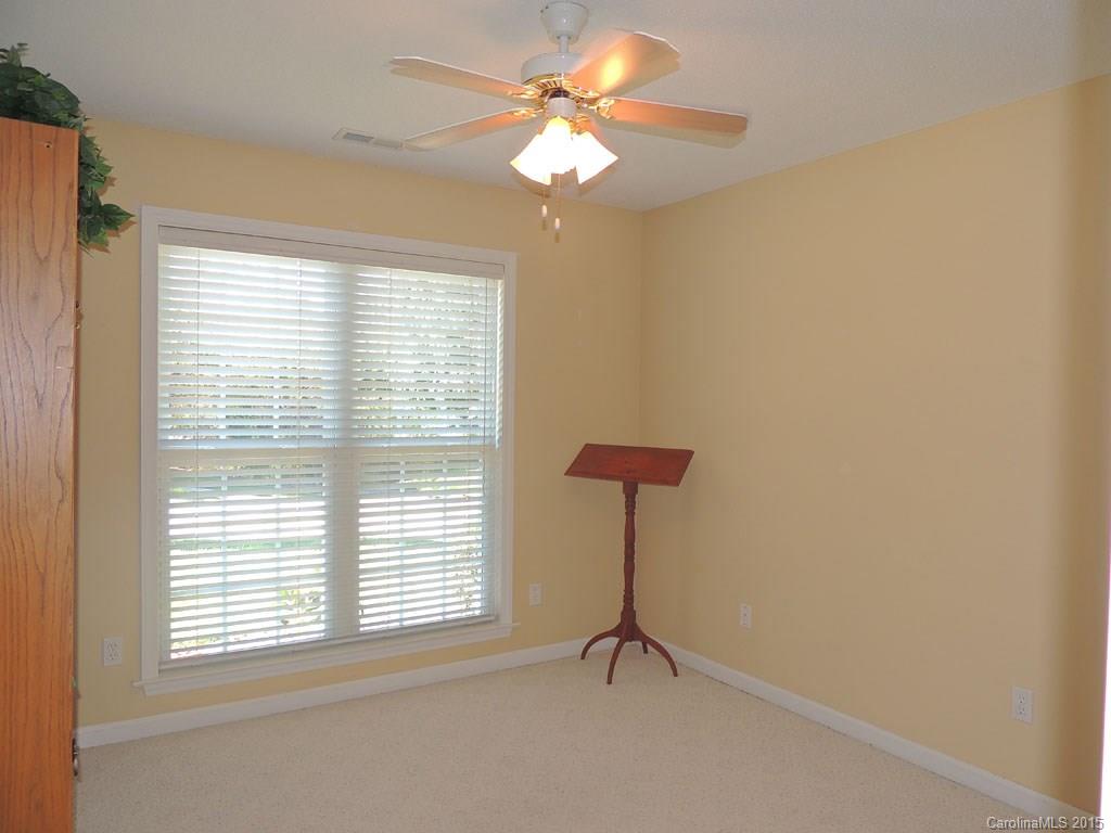 112 Forest Berry Road Fletcher, NC 28732 - Photo 11 of 21 a view of a room with a window and a ceiling fan