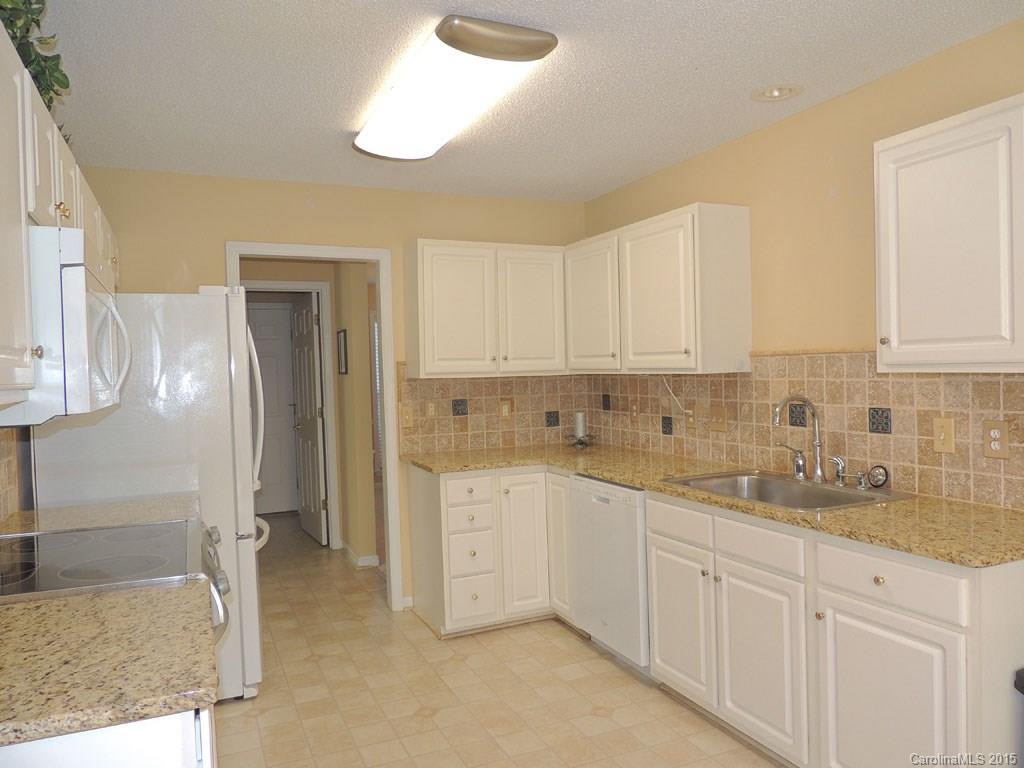 112 Forest Berry Road Fletcher, NC 28732 - Photo 6 of 21 a kitchen with sink and cabinets