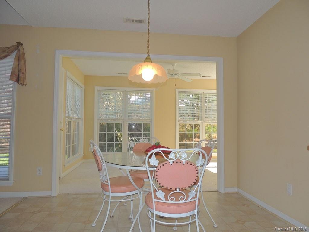 112 Forest Berry Road Fletcher, NC 28732 - Photo 8 of 21 a dining room with furniture and window
