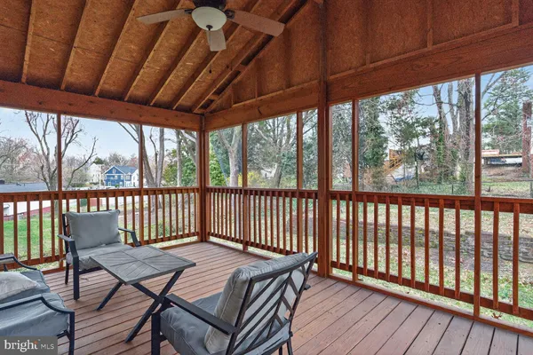 a view of a two chairs in the deck