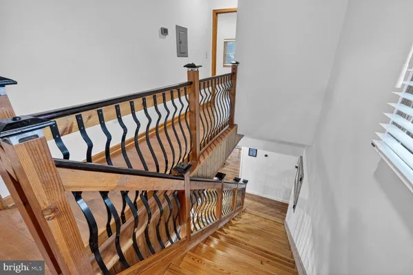 a view of entryway with wooden floor