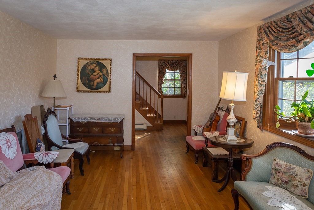 30 Pinewood Road Canton, MA 02021 - Photo 12 of 23 a living room with furniture and a wooden floor