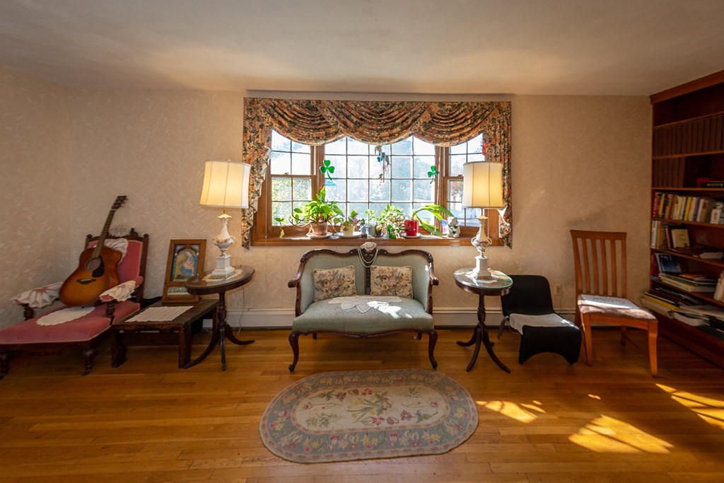 30 Pinewood Road Canton, MA 02021 - Photo 13 of 23 a living room with fireplace furniture and a large window