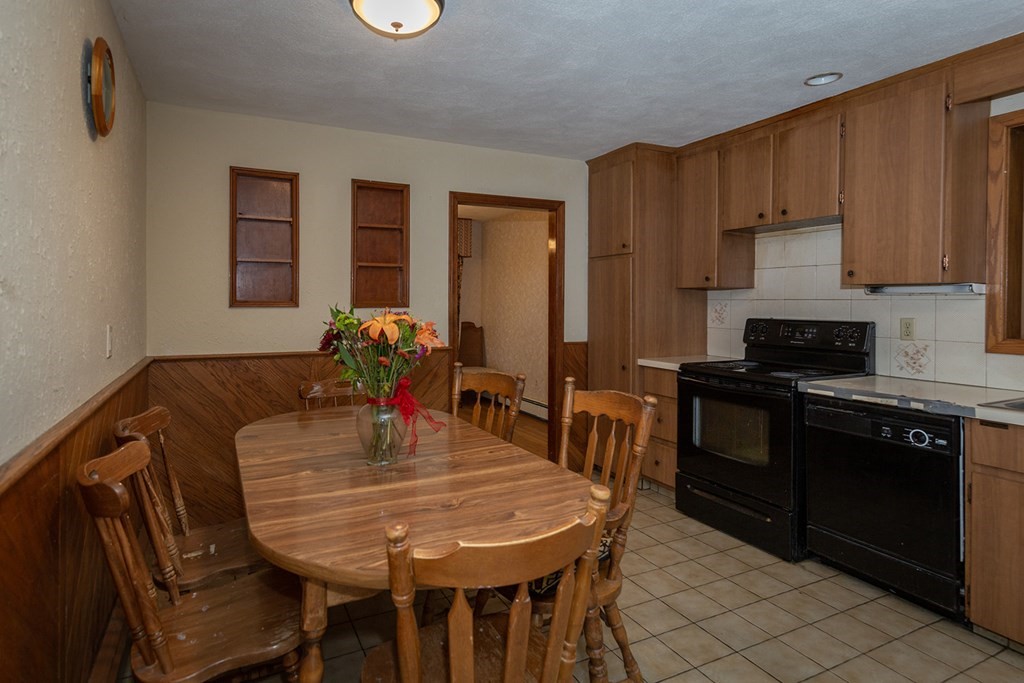 30 Pinewood Road Canton, MA 02021 - Photo 14 of 23 a dining room with furniture and wooden floor