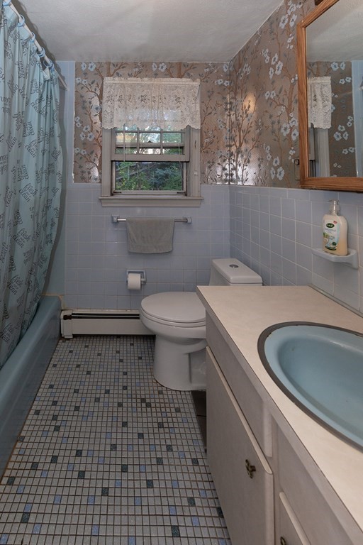 30 Pinewood Road Canton, MA 02021 - Photo 20 of 23 a bathroom with a sink a toilet and a mirror