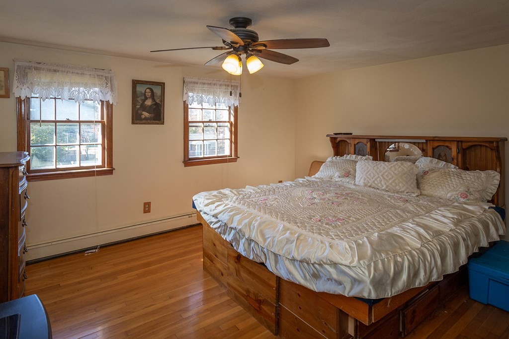 30 Pinewood Road Canton, MA 02021 - Photo 21 of 23 a bedroom with a bed and window