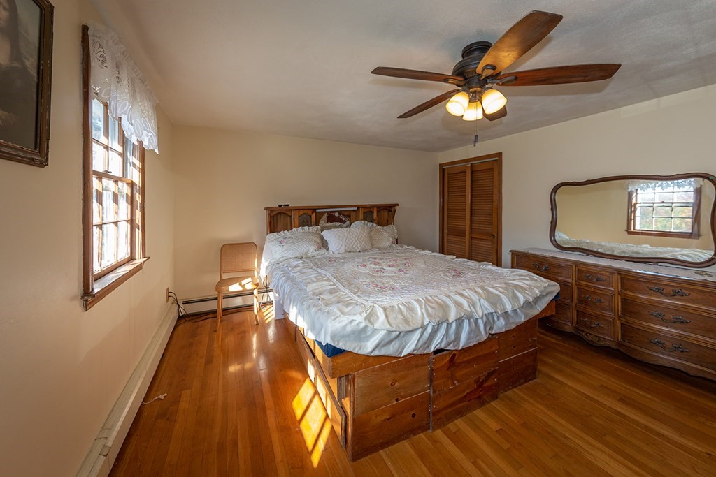 30 Pinewood Road Canton, MA 02021 - Photo 23 of 23 a spacious bedroom with a bed and a dresser