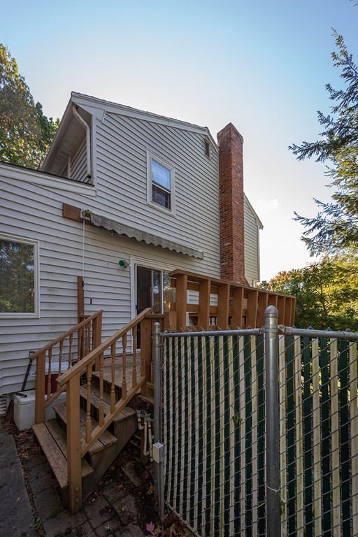 30 Pinewood Road Canton, MA 02021 - Photo 3 of 23 a view of wooden house with a deck