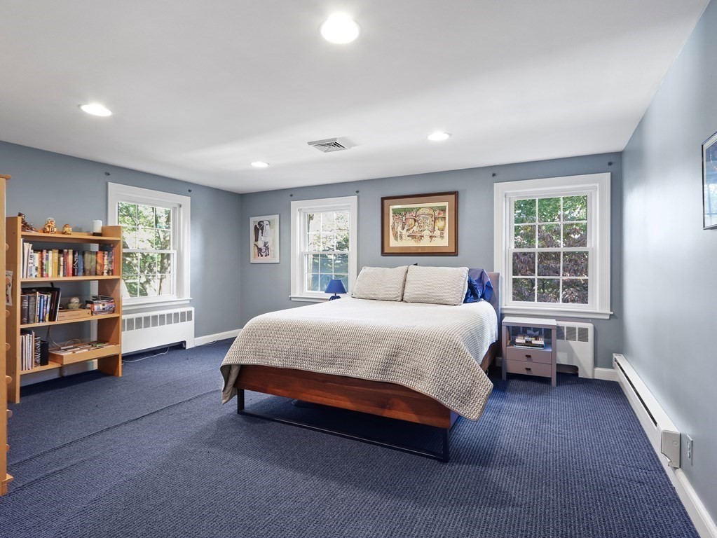 37 Richdale Road Needham, MA 02494 - Photo 16 of 23 a spacious bedroom with a bed and a window