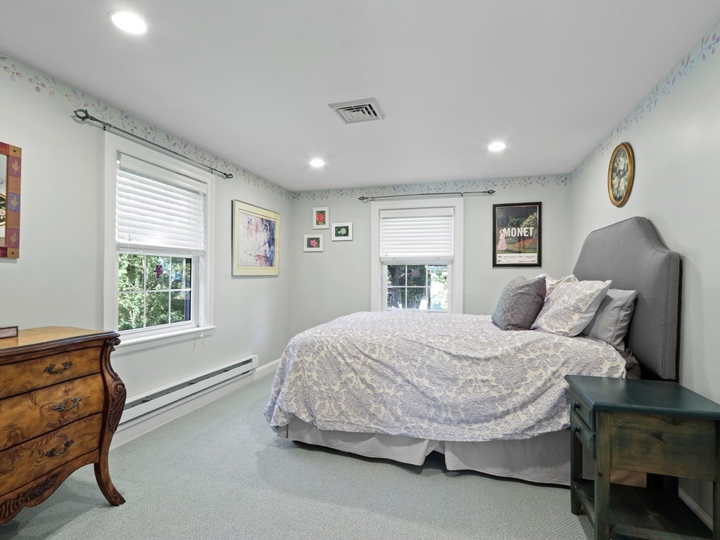 37 Richdale Road Needham, MA 02494 - Photo 17 of 23 a spacious bedroom with a bed and window