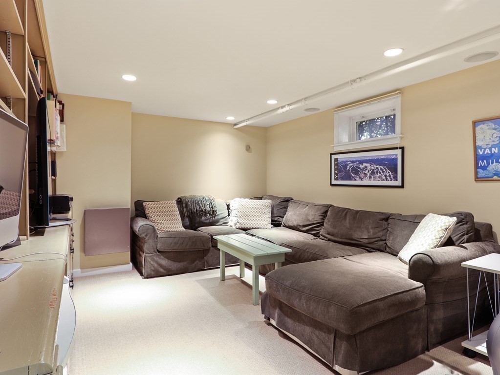 37 Richdale Road Needham, MA 02494 - Photo 20 of 23 a living room with furniture and a large window